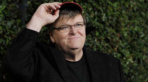 Michael Moore si schiera con Julian Assange